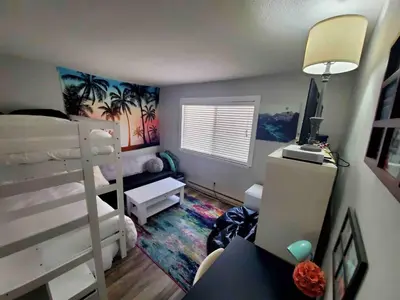 a dorm room with a bunk bed and a desk at North Tahoe Escape in Incline Village