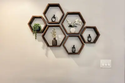 a group of framed mirrors hanging on a wall at Charming Home, near beautiful park and tennis courts! in Roseville