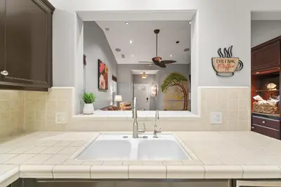 a kitchen with a sink in a room at Casita Andrade in Turlock