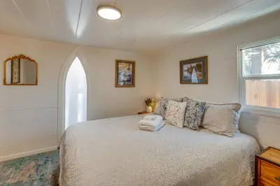 a bedroom with a bed and a window at Walk to Beach Dog-Friendly Cabin in Glenbrook! in Glenbrook