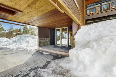 a house in the snow with snow around it at Snowpeak Serenity in Truckee