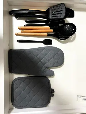 a drawer full of cooking utensils in a kitchen at Orchard Parks in Tracy