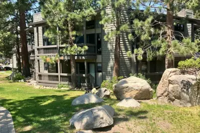 a building with a bunch of rocks in front of it at Sierra Park Villas 40 H in Mammoth Lakes