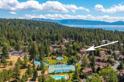 an aerial view of a resort with a pool and a house at Cozy Condo for 8 Hot-Tub HOA Amenities Walk to Beach Close to Slopes in Tahoe City