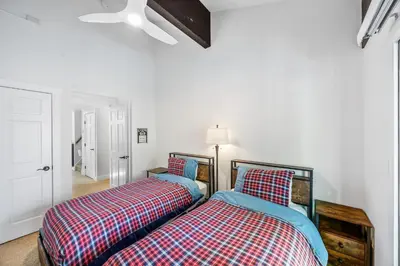 two beds sitting next to each other in a bedroom at Remodeled 4BR Lakefront with Exceptional Amenities in Kings Beach