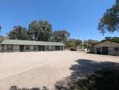 an empty driveway in front of a building at Squaw Valley Motel Room 5 in Squaw Valley