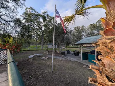 an american flag on a pole in a park at Squaw Valley Motel Room 8 in Squaw Valley