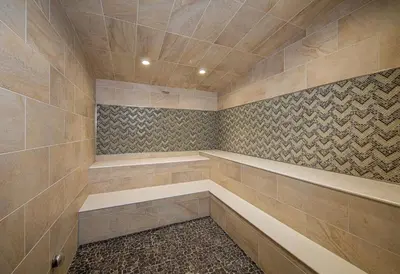 a tiled bathroom with a sauna with at Palisades Tahoe Lodge Rentals Premium Fireplace One Bedroom #807 in Olympic Valley