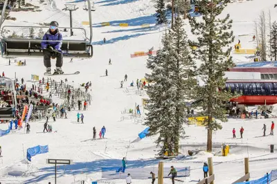 a group of people skiing on a ski slope at Northstar Paradise in Ponderosa Fairway Estates