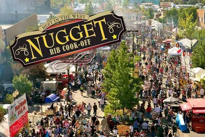 a large crowd of people at a fair at New Trendy 1BR Apartment with Heated Pool Gym & Minigolf in Reno