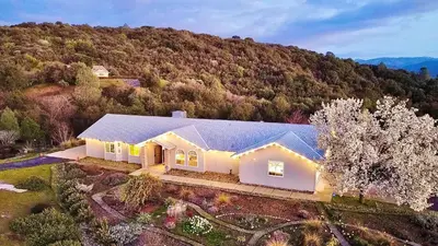 an overhead view of a white house on a hill at Home at Yosemite Oakhurst in Oakhurst