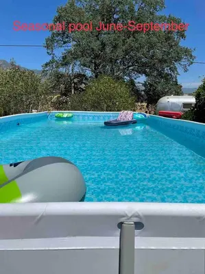 a swimming pool with an inflatable at Delilah Ridge Winery Mid Mod Guesthouse in Squaw Valley