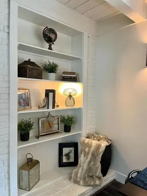 a room with white shelves with potted plants at Emerald Bay Escape in South Lake Tahoe