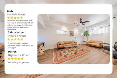 a living room with a couch and a rug at Stylish 2-Bedroom walking distance to Downtown in Reno
