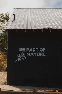 a building with the words be part of nature at Cosy yurt at a nature retreat in Miramonte