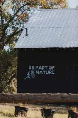 a sign that says be part of nature at Glamping yurt at nature retreat in Sequoia NForest in Miramonte