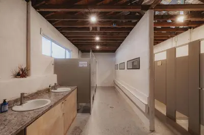 a large bathroom with two sinks and a window at Glamping yurt at nature retreat in Sequoia NForest in Miramonte