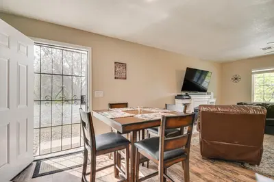 a kitchen and dining room with a table and chairs at Coulterville Home with Gazebo Near Lakes and Hiking! in Coulterville