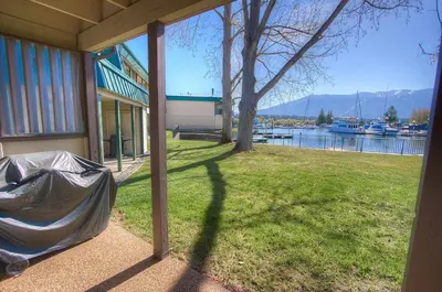 a porch of a house with a view of the water at TKC0604 - Betty Ann's Place condo in South Lake Tahoe