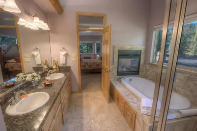 a large bathroom with two sinks and a tub at COH1669 - Hawk's View Hideaway home in South Lake Tahoe