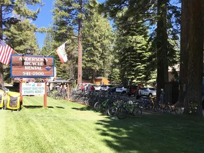 a sign with a bunch of bikes parked in the grass at COH1669 - Hawk's View Hideaway home in South Lake Tahoe