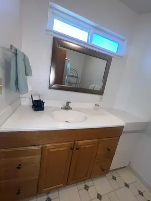 a bathroom with a sink and a mirror at HCH1475 - Heavenly Lake View Retreat home in South Lake Tahoe