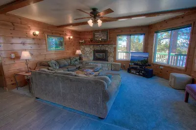 a living room with a couch and a fireplace at HCH1475 - Heavenly Lake View Retreat home in South Lake Tahoe