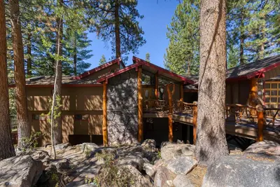 a cabin in the woods with trees at HCH1239 - Heavenly Tree House home in South Lake Tahoe