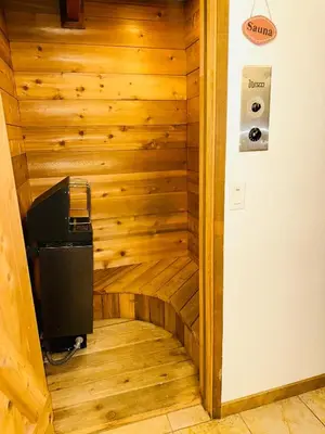 a room with a wood paneled wall and a television at CYH1281- Tahoe Acres home in South Lake Tahoe