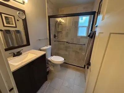 a bathroom with a shower and a toilet and a sink at HCC0410 - Heavenly Hideaway condo in South Lake Tahoe