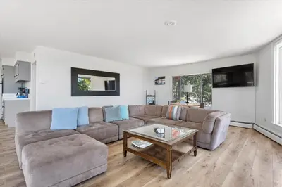 a living room with a couch and a table at HCH1083 - Mountain Serenity home in South Lake Tahoe