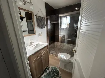 a bathroom with a sink and a toilet and a shower at COH0957 - Bella Ari home in South Lake Tahoe