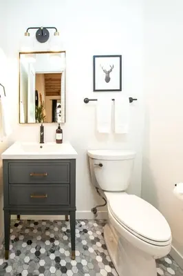 a bathroom with a toilet and a sink at Golden Antler Escape - Minutes to the Beach in Incline Village