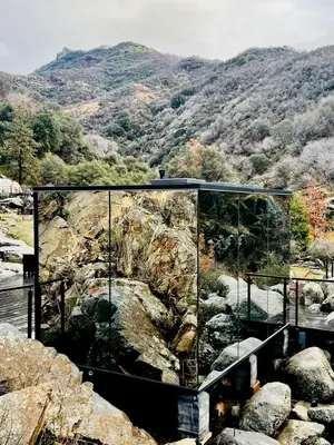 a glass house on top of a mountain at Spacious and Luxurious Barn in Three Rivers, California in Three Rivers