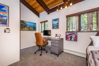a bedroom with a desk and a computer in a room at Mountain Escape - Lake Tahoe - Incline Village - Private Garage in Incline Village