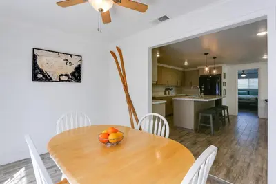 a dining room table with a bowl of fruit on it at Mtn-View Home with Patio and Grill in Woodlake in Woodlake