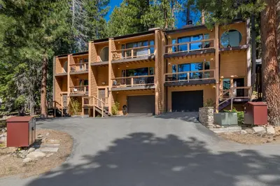 an exterior view of a house with a driveway at Mountain Getaway - Lake Tahoe - Incline Village - Private Garage in Incline Village