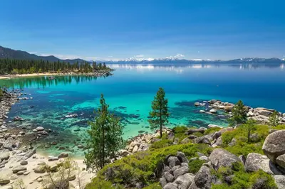 a view of crater lake from the shore at Lake Tahoe Adventure Base! Townhome with Pool Access in Wood Vista