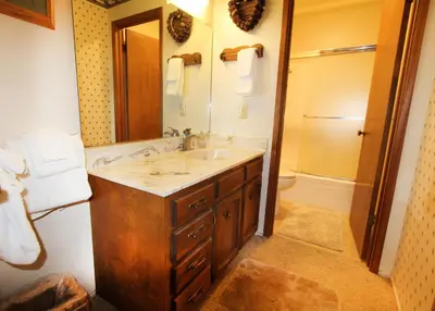 a bathroom with a sink and a toilet and a tub at HCC0612 - Sitzmark Ski Condo townhouse in South Lake Tahoe