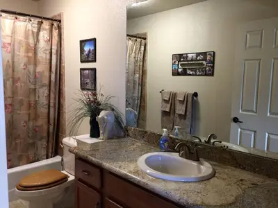 a bathroom with a sink and a toilet at Luxury Cabin Rental with a Fire Pit in Coulterville, California in Coulterville