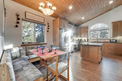 a kitchen with a table and some chairs in a room at Near Downhill Ski Resort! Hot Tub Haven in Truckee in Truckee