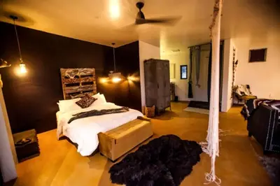 a bedroom with a bed and a ceiling fan at Stunning Lone Pine Accommodation for Romantic Getaways in California in Lone Pine