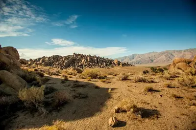 a view of a desert with mountains in the background at Stunning Lone Pine Accommodation for Romantic Getaways in California in Lone Pine