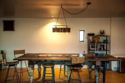 a dining room with a wooden table and chairs at Stunning Lone Pine Accommodation for Romantic Getaways in California in Lone Pine
