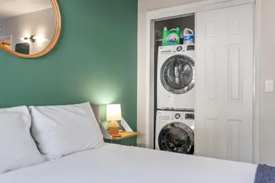a bedroom with a bed and two washing machines at HNC0617 - Stagecoach Summit Retreat condo in Stateline
