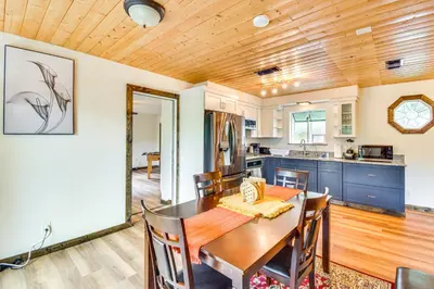 a kitchen and dining room with a wooden ceiling at Sierra Serenity Scenic Mtn Escape with Game Room in Oakhurst
