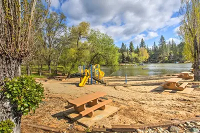 a park with a picnic table and a playground at Yosemite Home Base Community Perks and Lake Access! in Groveland