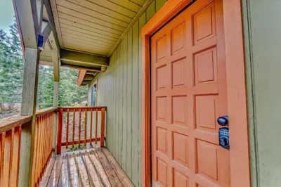 a door to a porch with a deck at Spacious Truckee Retreat with Fireplace & Deck in Truckee