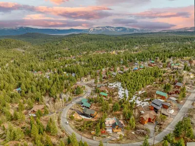 an aerial view of a town in a forest at Spacious Truckee Retreat with Fireplace & Deck in Truckee