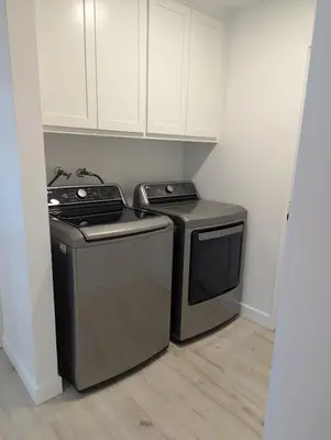 a kitchen with a stove and a dishwasher at Welcome to Lilith's House! in Clovis